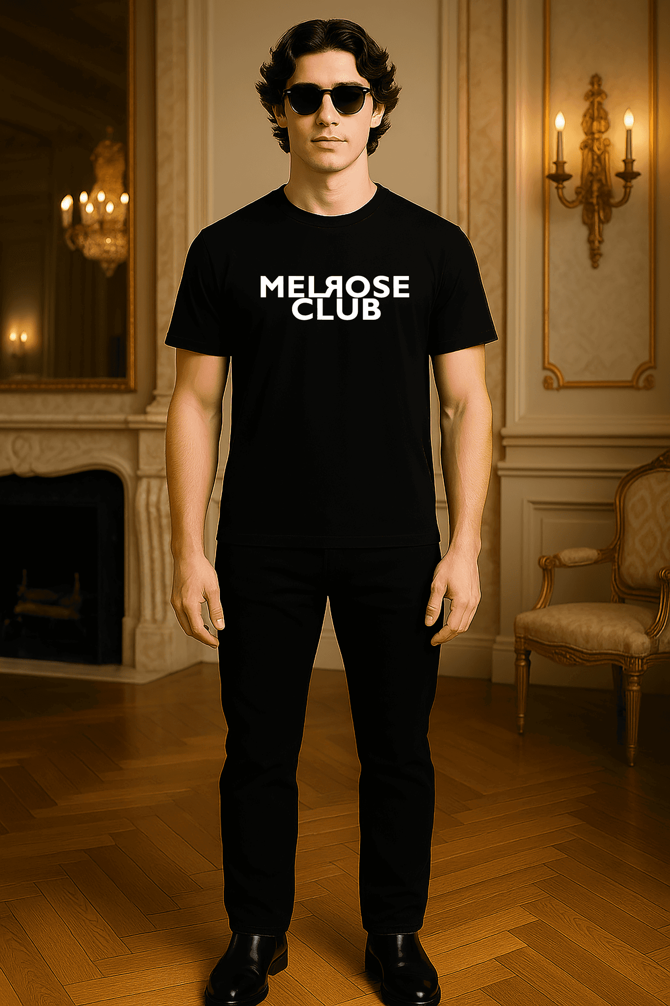 Male model wearing Melrose Club signature tee black with white logo in elegant room setting